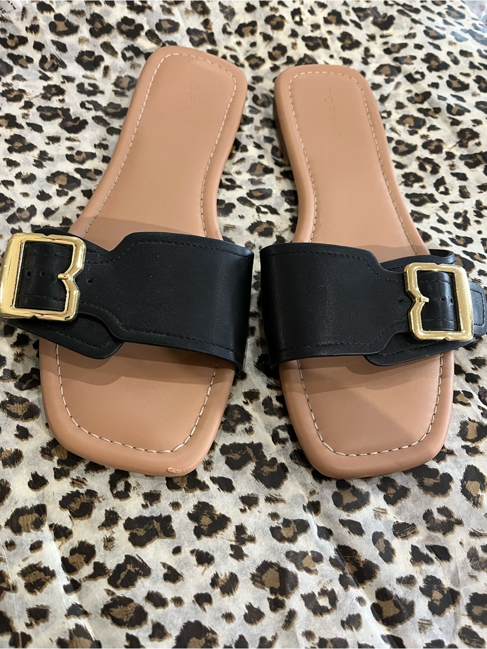 torrid Black Slide Mules with Gold Buckle and Tan Footbed